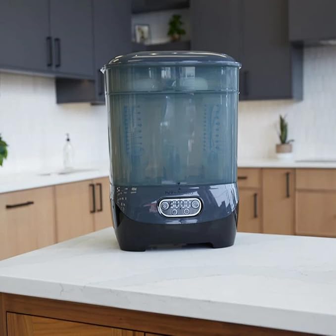 Baby Brezza Bottle Sterilizer and Dryer Advanced – 33% Faster - Largest Capacity Steam Sanitizer - Universal Sterilization Machine for All Bottles + Pump Parts - HEPA Air Filter, Charcoal