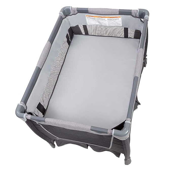 Baby Trend Nursery Center Travel Crib with Removable Rock-A-Bye Bassinet, Changing Table, Organizer, and Electronic Music Center and Nightlight, Robin