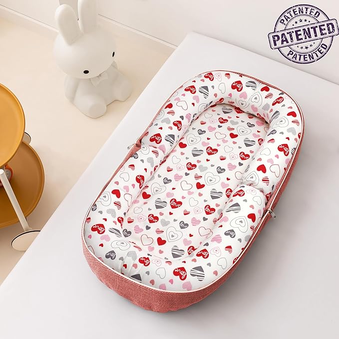 Baby Lounger, Foldable Infant Nest Pillow with Soft Memory Foam Mat, Cover with Adorable Pattern, Converts to Backpack for Easy Travel, 0-12 Months, Pink